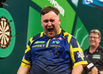 At 18, he is world darts champion for the second time in a row